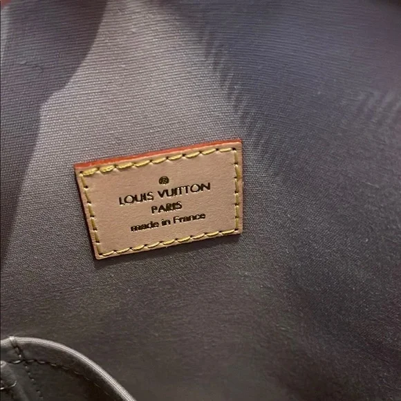 Louis Vuitton Gold Shoulder Bag with Iconic Monogram